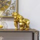 FIGURA MONO RESINA DORADO 29X17X30 CM.
