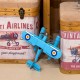 FIGURA AVIÓN BIPLANO AZUL HOJALTA Y RESINA RETRO 18X20X8 CM.
